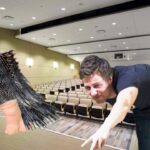 Now it’s War! Fish with Legs Thrown on Stage During Evolution Lecture