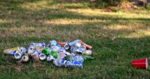 Eco-Conscious Student Kicks Beer Can Under Bench