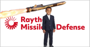 Aww! Big Boy Dressed Up in His Specialest Suit for Interview with Arms Manufacturer