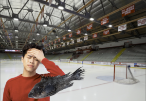 Patient Hockey Fan Waiting For Ice To Melt Before Throwing Fish Into New Home