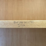 Motivational Message Etched Into Library Desk Undermined By Penis Right Beneath It